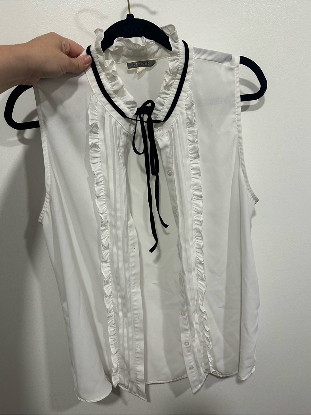 Pleione White Sleeveless Ruffle Blouse with Black Tie